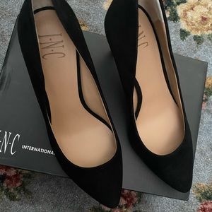 Gently worn black suede pumps